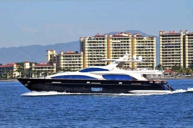 The Azimut 105 cruising past the Puerto Vallarta coastline