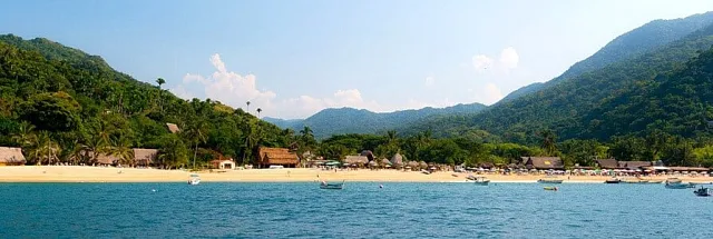 The bay and beach at Yelapa backed by green hills