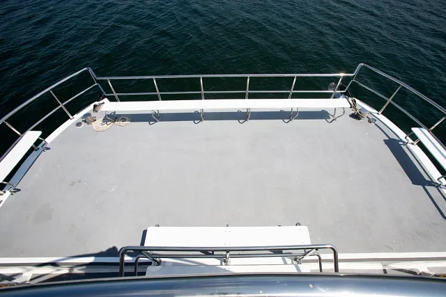 The open upper deck of a large event catamaran