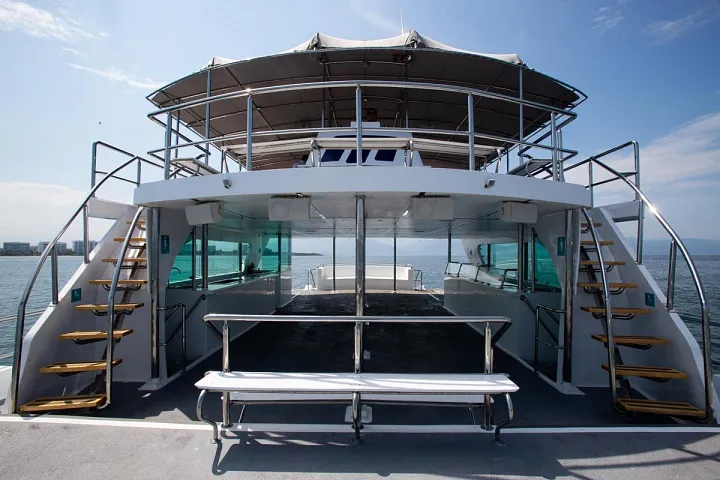 Stern stairs and main deck of Catamaran 72