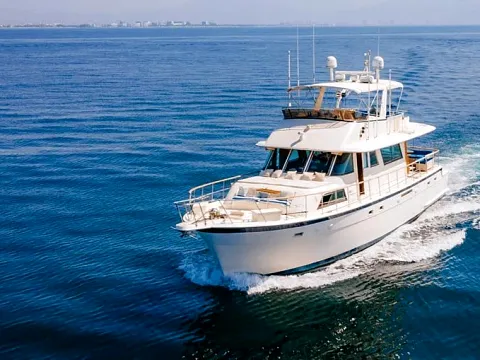 Hatteras 61 — classic flybridge yacht available for private charter