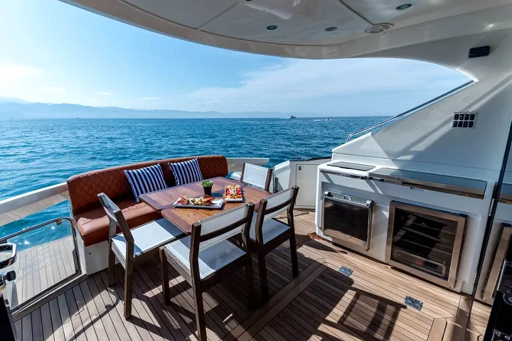 Cockpit dining area aboard the Marquis 50